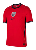 England 2026 away shirt front, red with navy trim