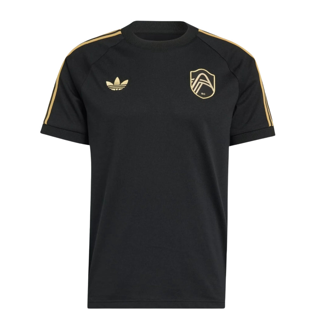 St. Louis City 2026 black travel shirt front with gold crest and shoulder stripes