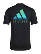 Seattle Sounders FC 2026 black travel shirt with large teal SEATTLE graphic