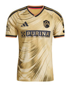 St. Louis City 2026 away shirt front, gold Tina Turner kit with swirl pattern